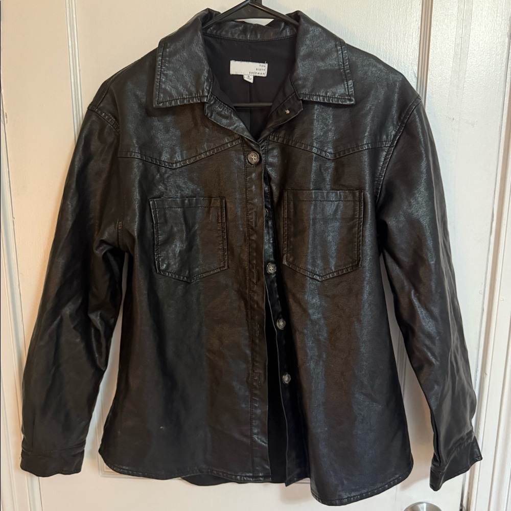 Lightly worn faux leather button up